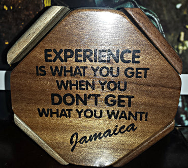Handcrafted in Jamaica with the addition of 'inspiring' phrases. They include: "A man's gotta believe in something! I believe I'll have another drink!!" "Jamaica where big wood grows wild & free" "Onnu backside!" "Life without humor is no life at all!!" "Some friends of mine visited Jamaica and all they brought home for me was this ridiculous piece of wood! Guess I'll have to visit there myself and bring back some of the good stuff!!"